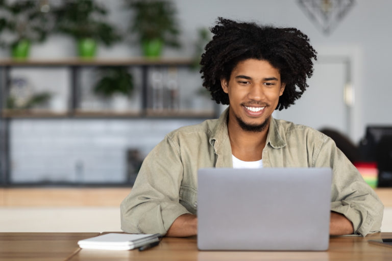Image of male therapist excited about engaging in online certification training program for schema therapy at the schema therapy training center of New York.