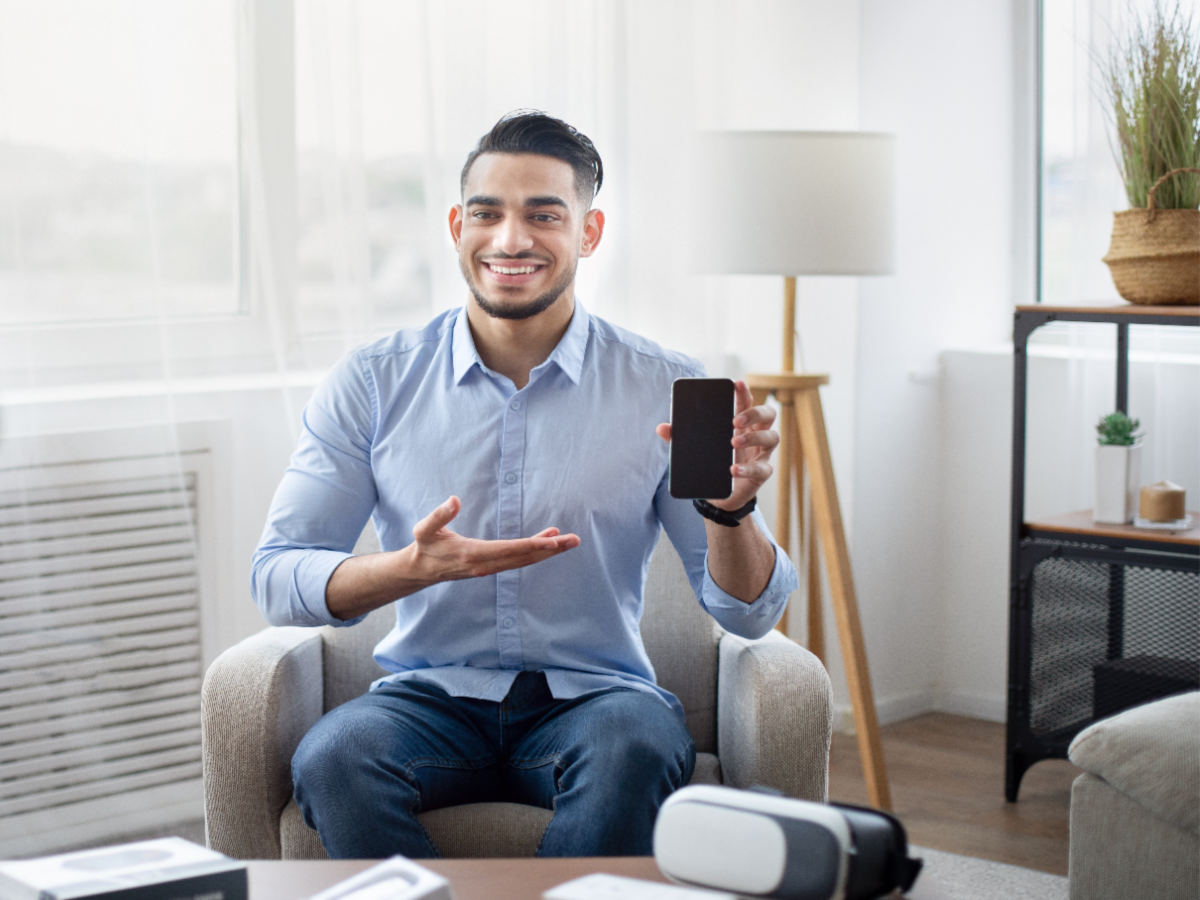 A focused therapist using a digital device to enhance schema therapy training techniques, representing modern mental health advancements and professional development for psychotherapists.