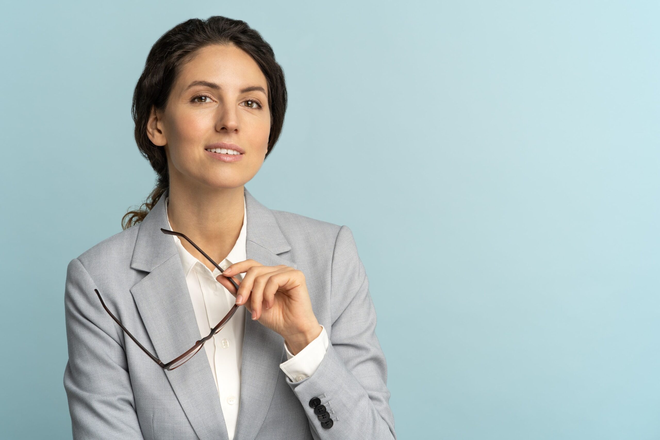 Illustration of a person in a thinking pose surrounded by interconnected lines and thought bubbles
